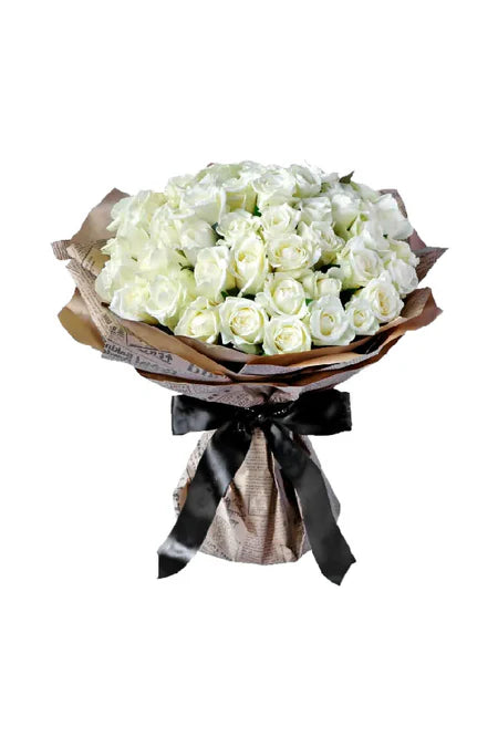 Longing White Bloom Bouquet – elegant hand-tied bouquet with white flowers for sympathy, remembrance, or graceful gifting in Riyadh